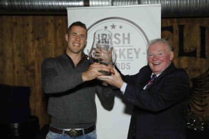From left: Finn McDonnell of Dick Macks in Dingle is presented with the Overall Irish Whiskey Bar of the Year 2015 by John Teeling. 
