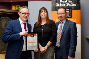 From left: BOIPA’s Stephen Ahern with Deirdre Devitt (accepting on behalf of Jobstown House the Innovative Pub of the Year award for the Dublin region) and LVA Chairman John Gleeson.