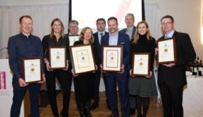Happy out - NOffLA's Irish Wine Show award winners with their plaques.