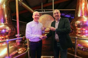 From left: Bernard Walsh of Walsh Whiskey picks up the Best Irish Whiskey of the Year Award from Bushmill’s Master Distiller Colum Egan.