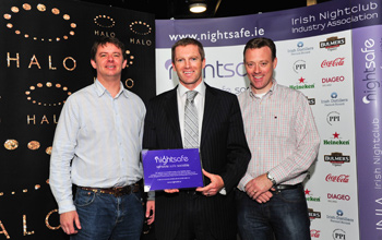 INIA Chief Executive Barry O’Sullivan presents the NightSafe award Bernard O’Neill (left) and Alan Connolly (right) of Halo and Central Park nightclubs.