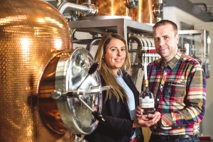 Fiona and David Boyd-Armstrong of Rademon Estate Distillery, Co Down, producers of Ireland’s international award-winning gin, Shortcross, with their special gold wax topped Shortcross Gin anniversary edition bottle.