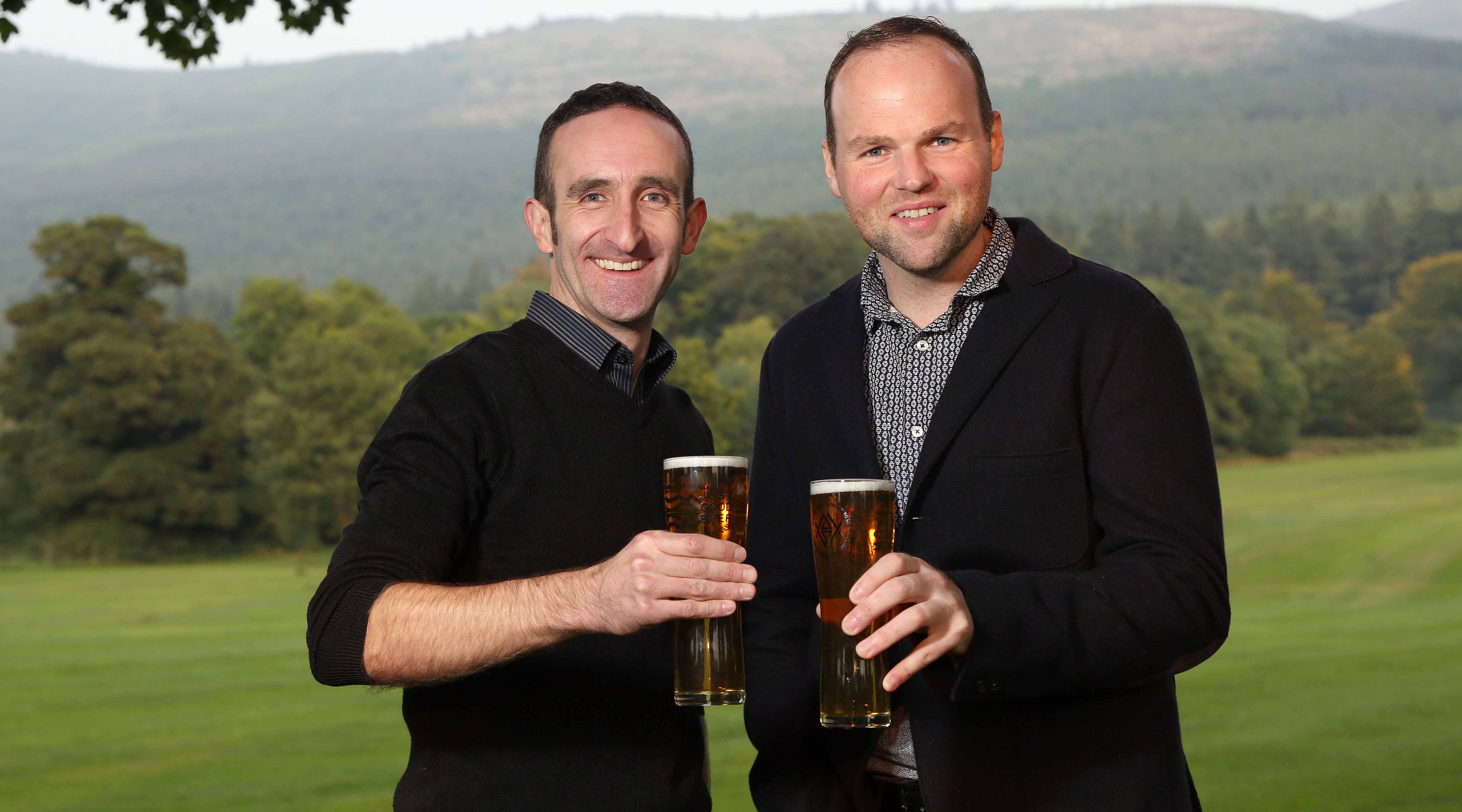 Enjoying a pint of Mourne Gold, one of the brewery's core beers, is (from left) Master Brewer Tom Ray with Connaire McGreevy, founder of Mourne Mountains Brewery. 