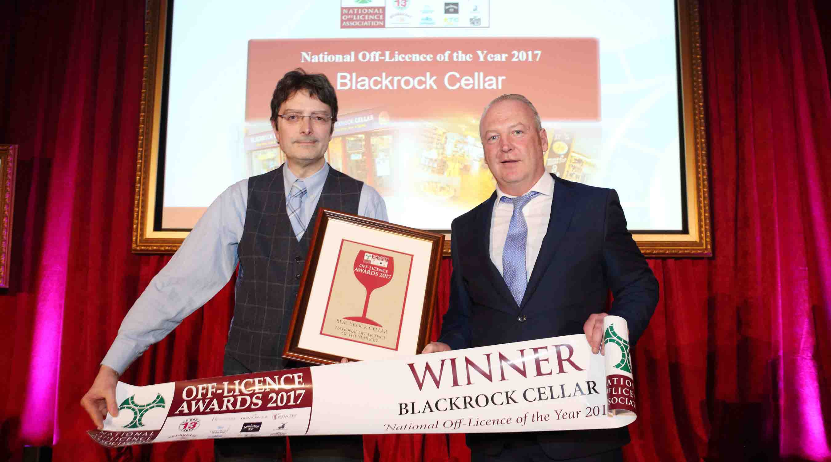 Joel Durand of Blackrock Cellar being presented with the award for NOffLA Off Licence of the Year 2017 by NOffLA Chairman Gary O'Donovan.