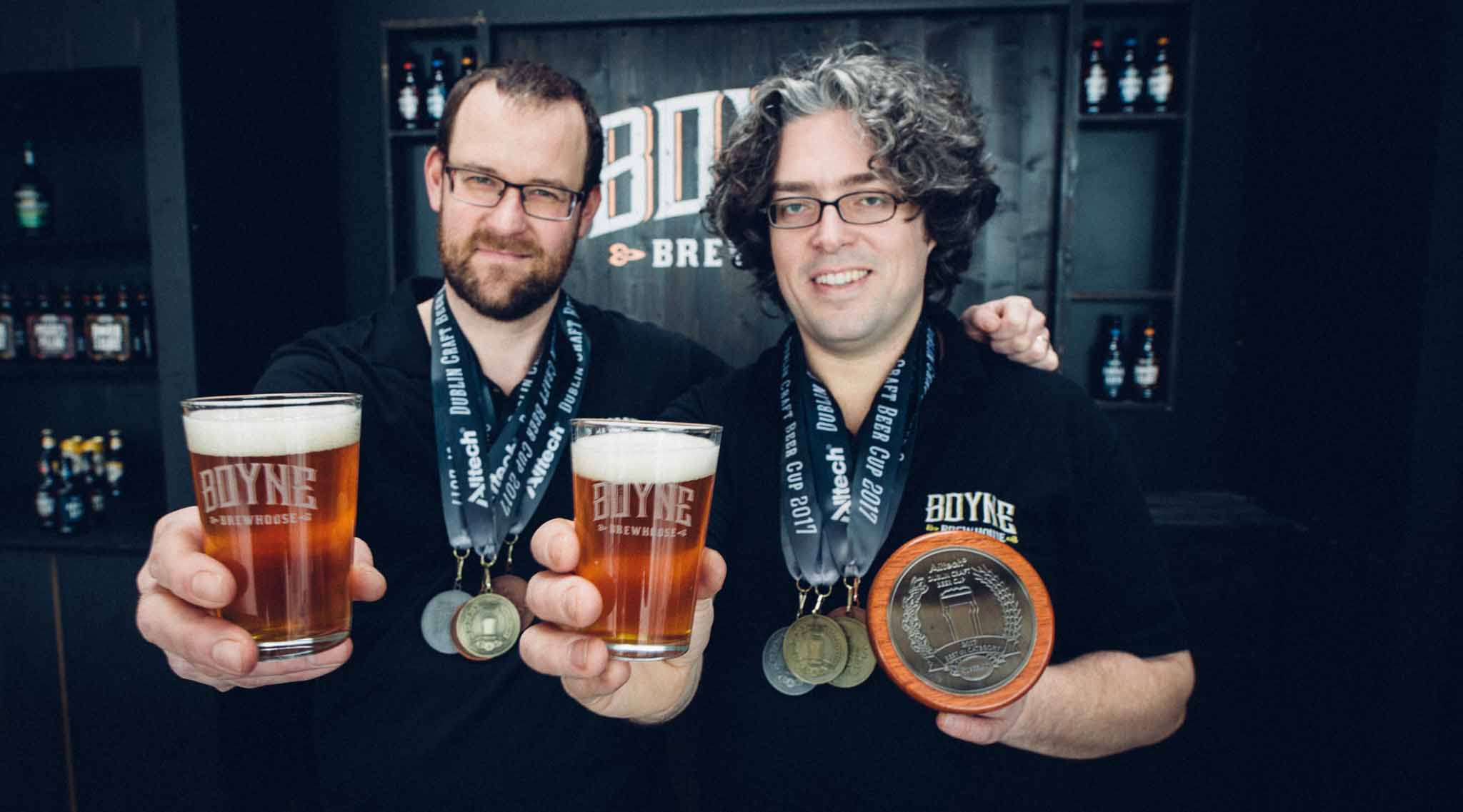 Brewhouse Head Brewer Andrew Jorgensen and Richard Hamilton with the Alltech Dublin Craft Beer Cup awards.
