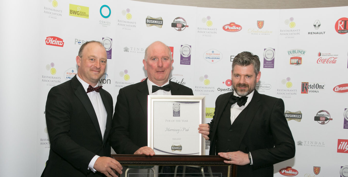 From left: Seamus Lowry from Bushmills – Pub of the Year sponsors, Tom Lennon of Morrissey's Pub and Fergal Wilson of Bushmills.
