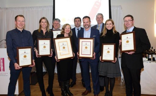 Happy out - NOffLA's Irish Wine Show award winners with their plaques.