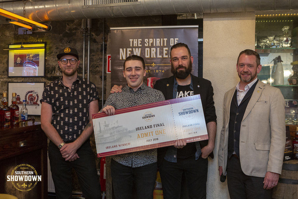 From left: Judge Christian Tirel and Southern Comfort Southern Showdown competition winner Shane Groarke, with judges David RS Guerrero and George Roberts.