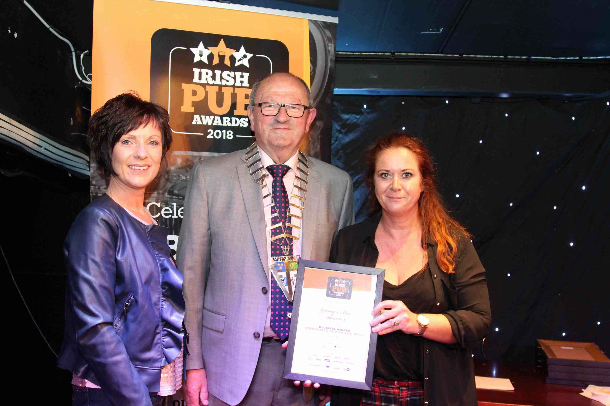 Cork’s Innovative Pub of the Year winners (from left): Elaine Doyle of Geary’s Bar in Charleville County Cork with VFI President Padraic McGann and Geary’s Bar’s Corina Gough.