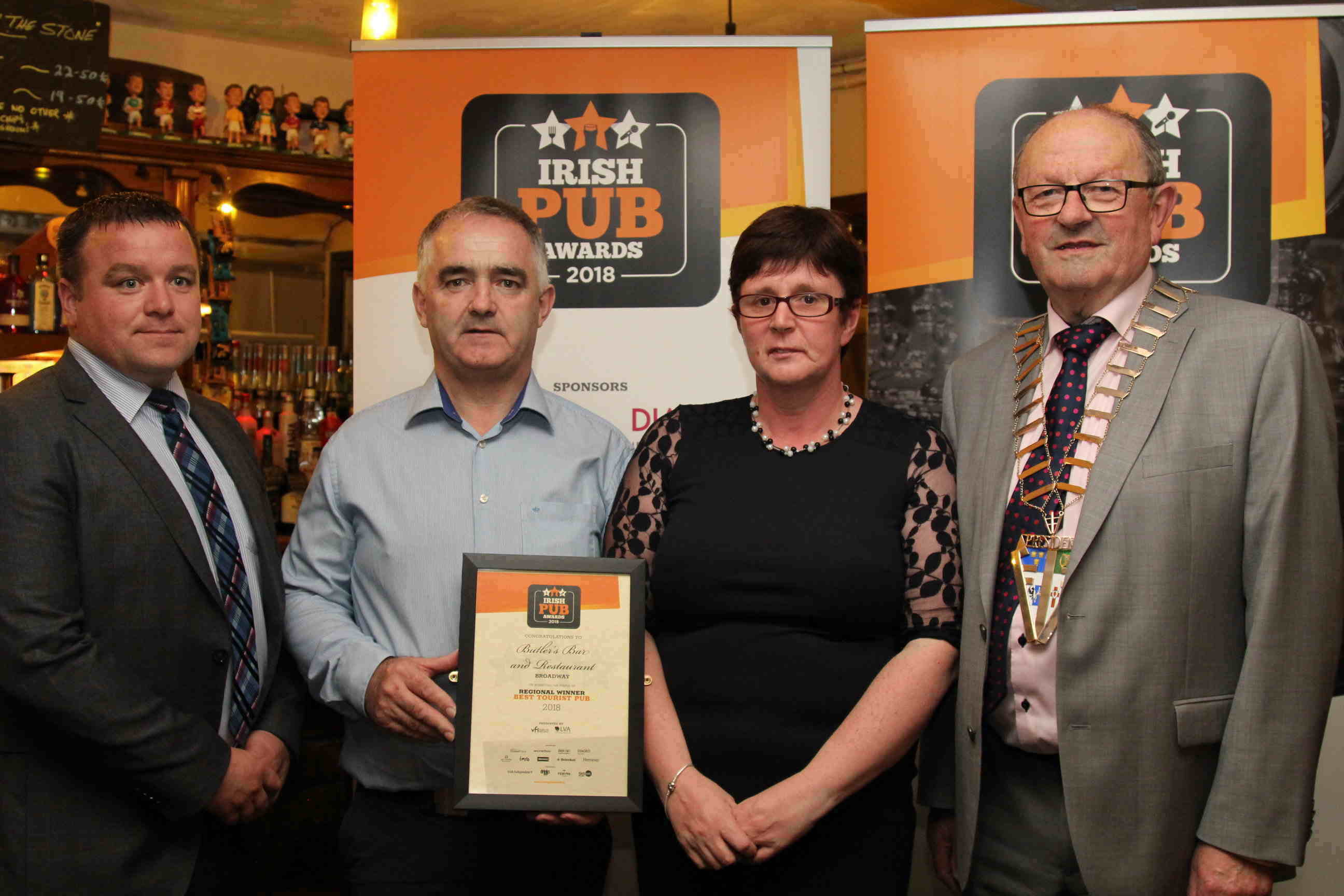 From left: Molson Coors’ Jack Wallace with Best Tourist Pub winners Pat and Catherine Cullen of Butler’s Bar & Restaurant, Broadway Co Wexford and VFI President Padraic McGann.