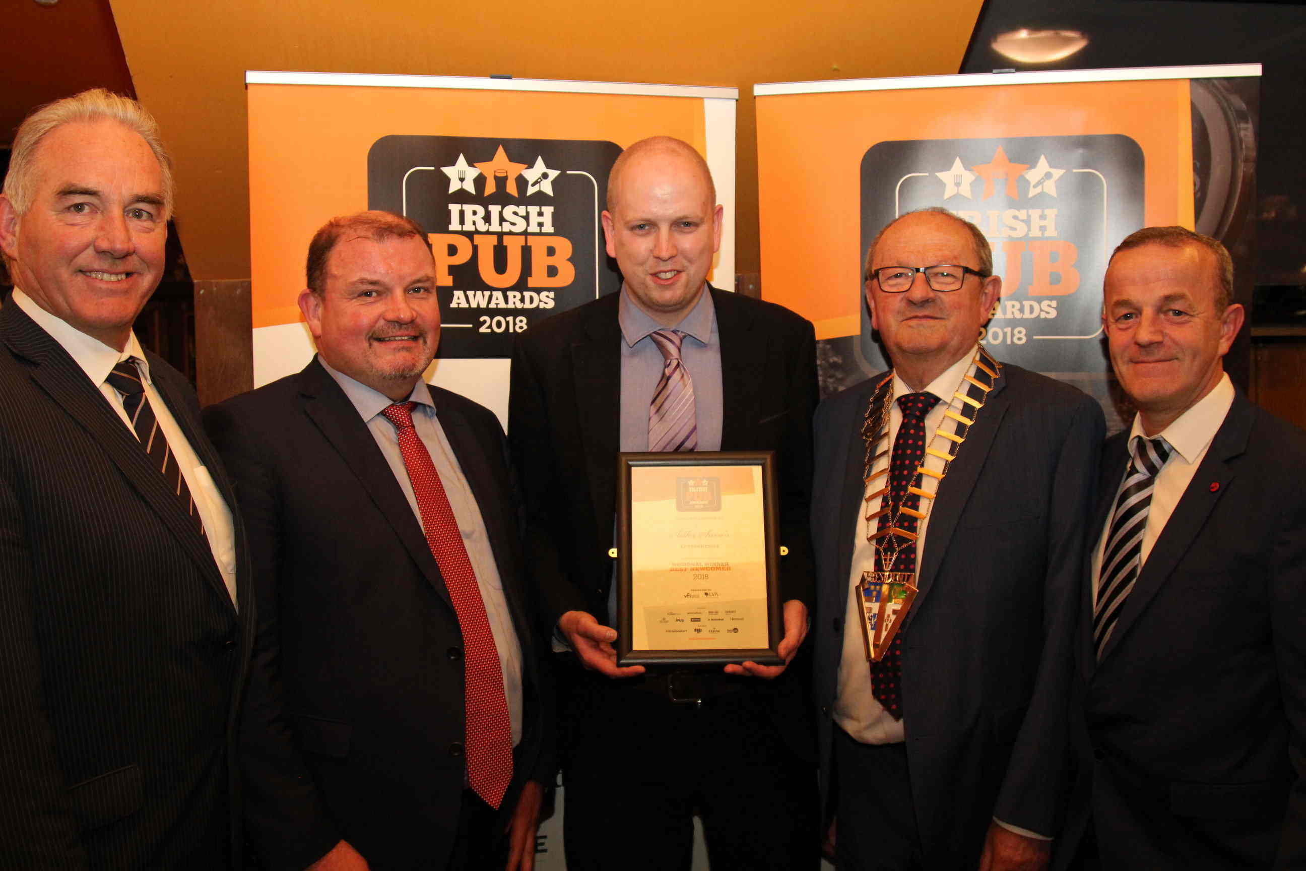 From left: Gary Mitchell of Hennessy with Ciaran Brogan and Peter Courtney from Sister Sara’s, Letterkenny, Co Donegal and VFI President Padraic McGann, with Sister Sara’s Frank Duff.