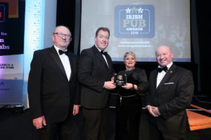 From left: VFI President Padraic McGann and On-Trade Director for Molson Coors Ciaran Budds present the Best Tourist Pub of the Year award to Cherrifaye Grahame from The Old Town Whiskey Bar at Bodega, with LVA Chairman Alan Campbell.