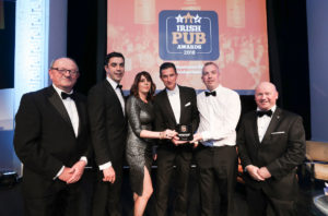 From left: VFI President Padraic McGann and BoIPA’s Director of Marketing Barry Gray present the Innovative Pub of the Year award to Deirdre, Brian and Ronan Devitt from The Two Sister's Pub, Terenure, with LVA Chairman Alan Campbell.
