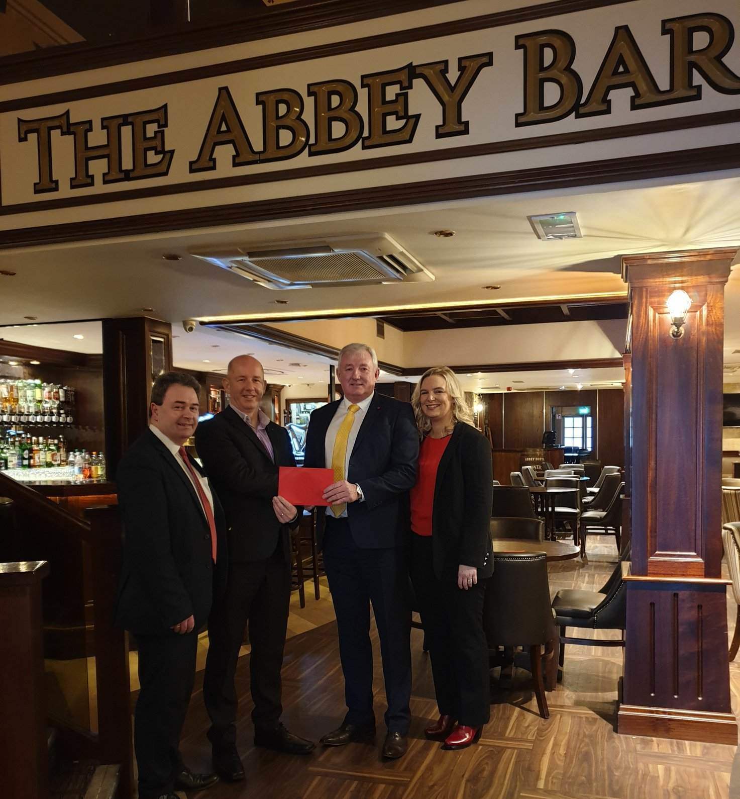 From left: Presenting the prize is Coca-Cola HBC’s Stephen King with the Abbey Hotel’s General Manager Danny O’Donnell alongside his valued team members Marketing Manager Elaine McInaw and Bar Manager Andrew Quinn.