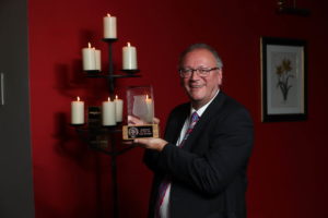 IDL Master Blender Billy Leighton with his award for Best Irish Whiskey of the Year for Redbreast 12 Year-Old Cask Strength.