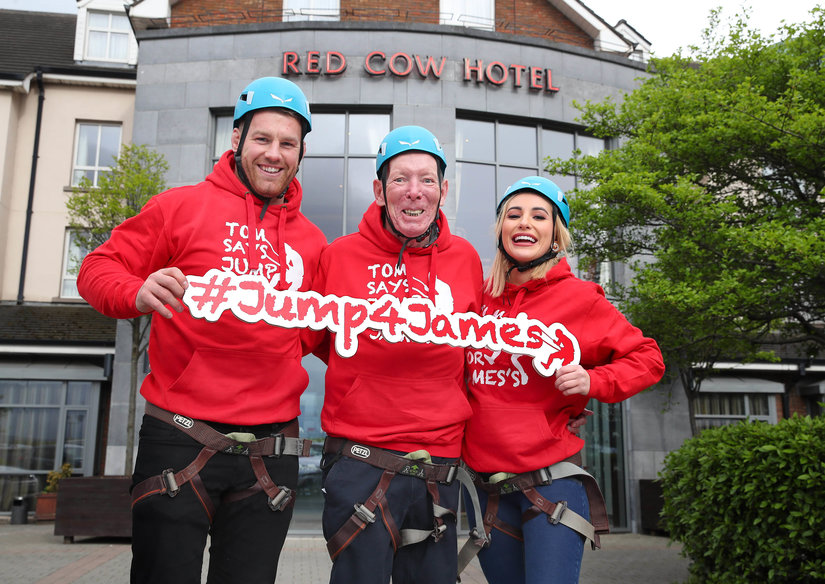 Cap: From left: Leinster and Ireland rugby player Sean O'Brien, Tom Moran, Chief Executive of The Red Cow Moran Hotel, country singer and Dancing with the Stars finalist Cliona Hagan at the launch of the ‘Jump4James’ Abseil Challenge.