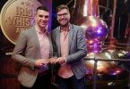 From left: Ian Doody and Fergal McGuinness with the award for Best Irish Poitín at the Irish Whiskey Awards in Dingle Distillery.