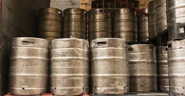 Possible hazards include impacts from falling kegs.