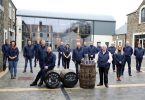 Hinch Distillery Chairman Dr Terry Cross OBE with the Distillery team.