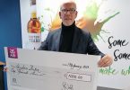 Bernard Walsh of Walsh Whiskey with the third Annual Walsh Whiskey Bursary cheque for €1,000 won by Stephen Foster, a Second Year student in the Brewing & Distilling Degree course at Institute of Technology Carlow.