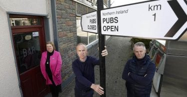 Close to the border in Clontibret were (from left): Diane Kendrick, owner of The Coach House and Olde Pub, Glaslough, Co Monaghan; Brian Renaghan, owner of Renaghan’s Bar in Clontibret and Ray Aughey, owner of The Squealing Pig in Monaghan Town.