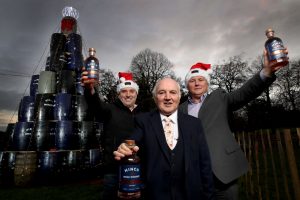 Launching the season to be jolly will be Hinch Distillery’s unveiling of its unique 24ft tree made from up-cycled whiskey barrels and topped off with sparkling lights and a luscious bow. From left: Hinch Distillery Director Patrick Cross, Chairman Dr Terry Cross OBE and General Manager Cathal McNicholl.