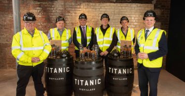 At the announcement in the Titanic Pump-house are (from left): Peter and Sean Lavery of Titanic Distillers, Invest NI Interim Chief Executive Mel Chittock, Richard Irwin and Stephen Symington of Titanic Distillers and NI Economy Minister Gordon Lyons.