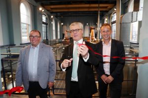 Pictured at the official opening of Titanic Distillers at Thompson Dock are UK Minister for Exports Lord Offord, who performed the opening ceremony, with Titanic Distillers directors Peter Lavery (left) and Stephen Symington (right).